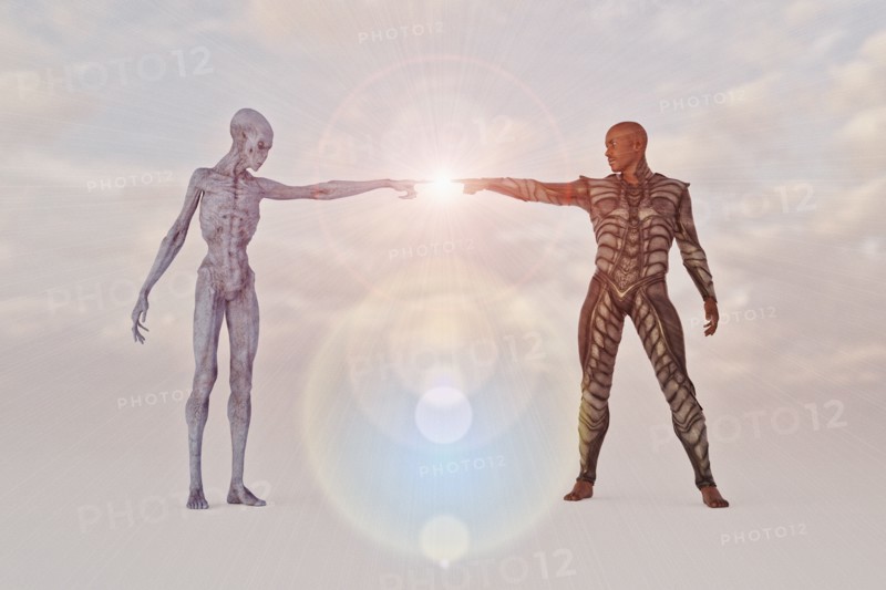 Man and alien touching glowing fingers