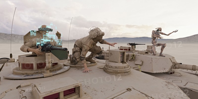 Soldiers and robot on tank wearing virtual reality goggles