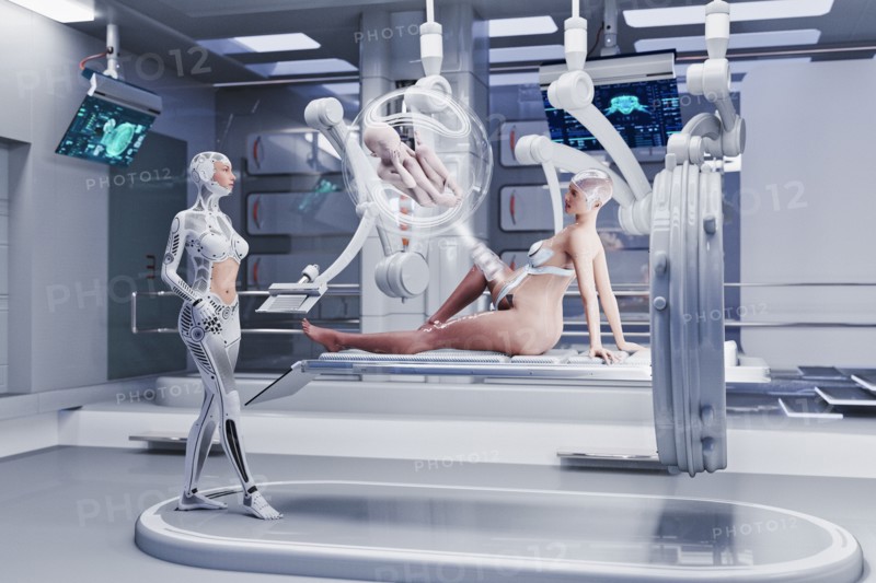 Futuristic nurses examining expectant mother