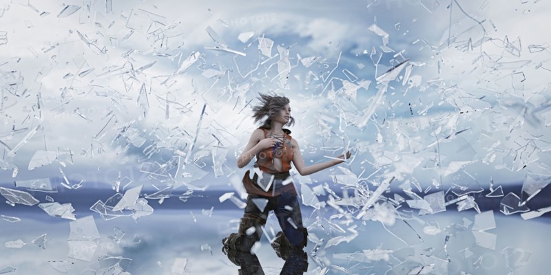 Shards of glass surrounding kneeling woman