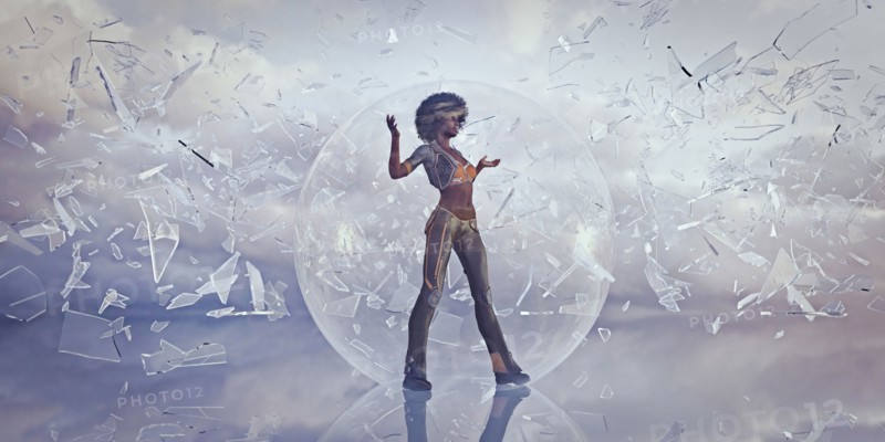 Woman standing in sphere protected from falling shards of glass