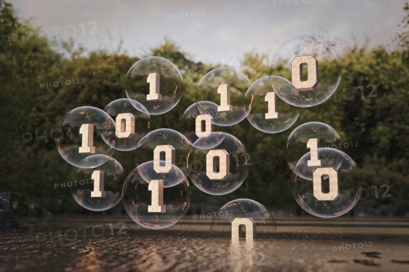 Binary code floating in bubbles above river