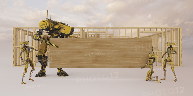 Construction robots holding wooden board with copy space