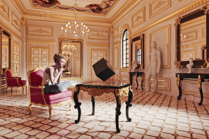 Woman watching floating cube in sitting room