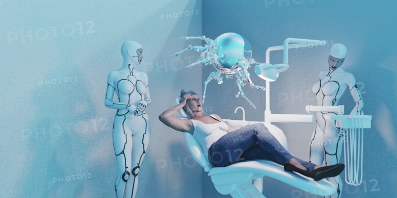 Android women watching robot perform dentistry on woman