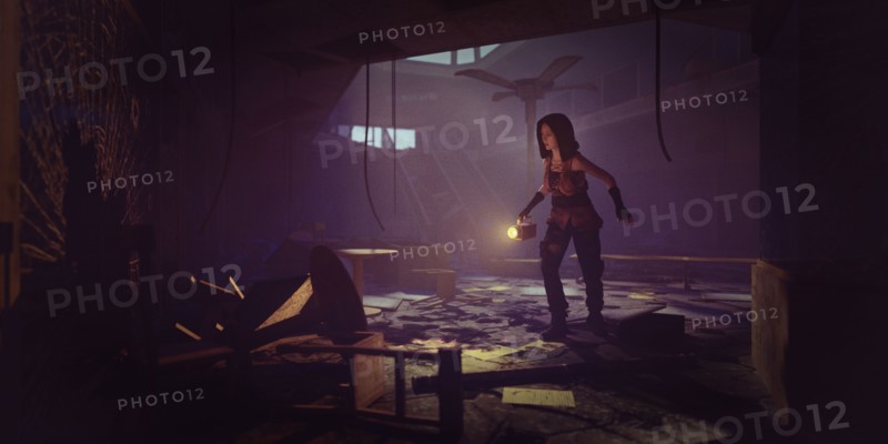 Woman holding flashlight exploring building ruins