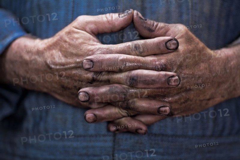 Close up of Caucasian mechanic's dirty hands