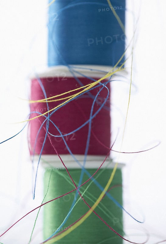 Stacks of spools of multicolor thread