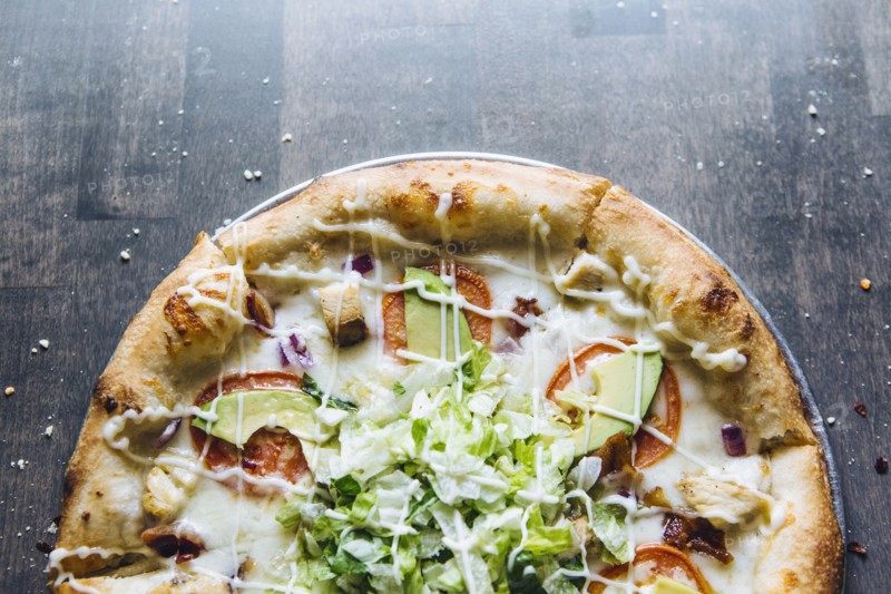 Close up of fresh pizza on platter
