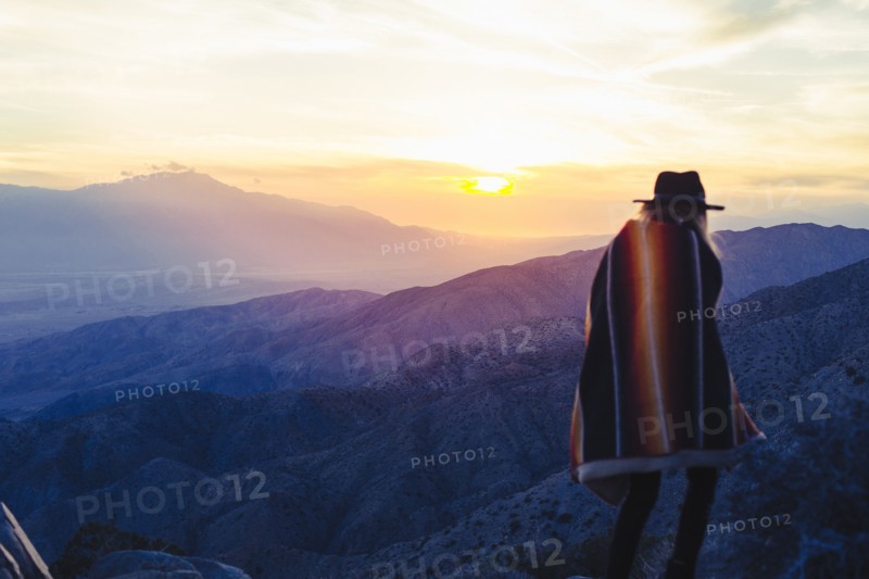 Caucasian woman overlooking remote desert landscape