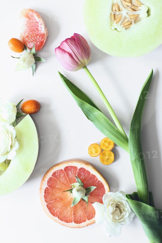 Flowers and sliced fruit
