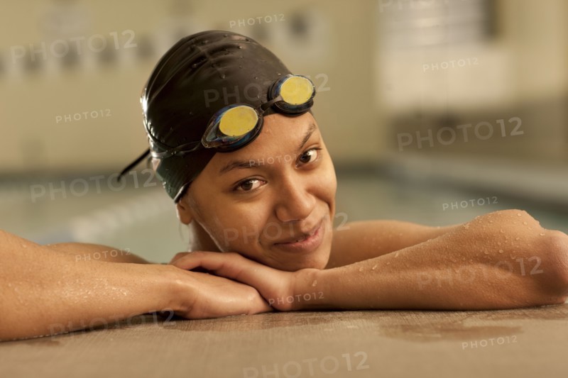 Pacific Islander swimmer in swimming pool