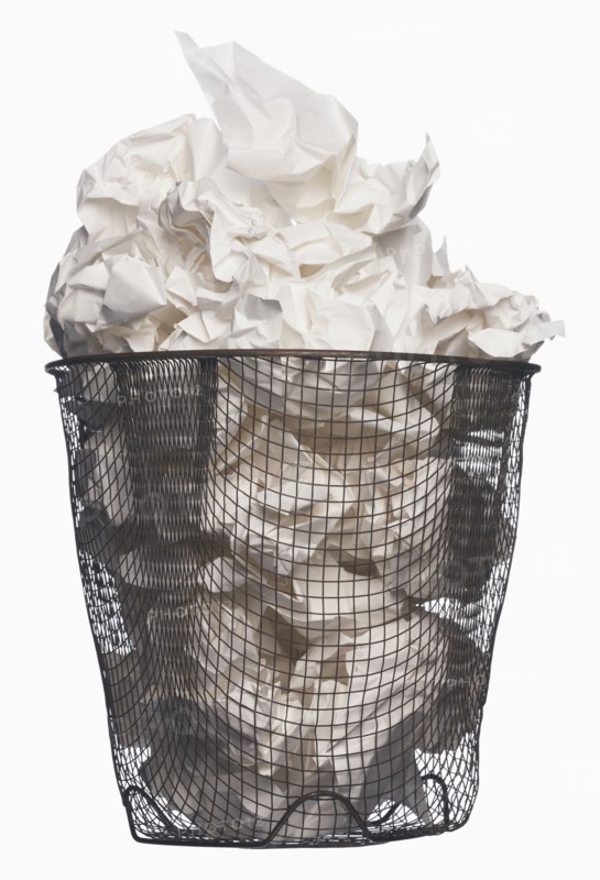 Wastepaper basket full of garbage