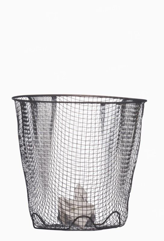 Crumpled paper in wastepaper basket
