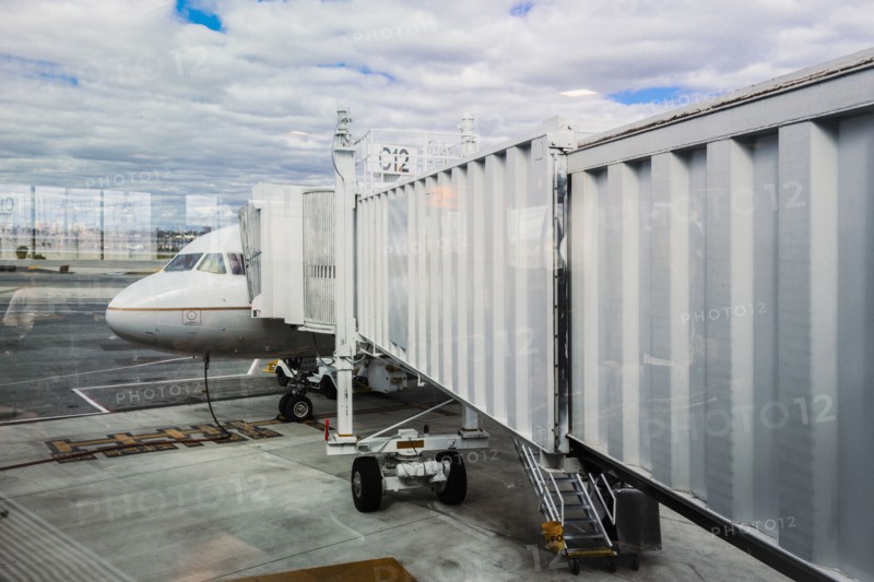 Walkway to airplane on runway