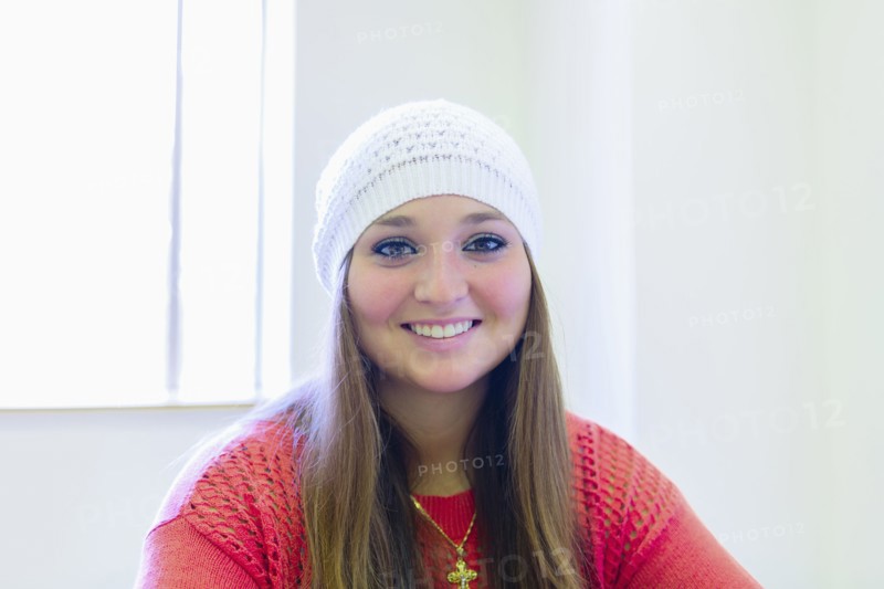 Caucasian student smiling in class