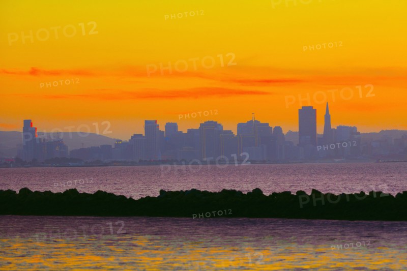 Colorful sunset sky over San Francisco city skyline