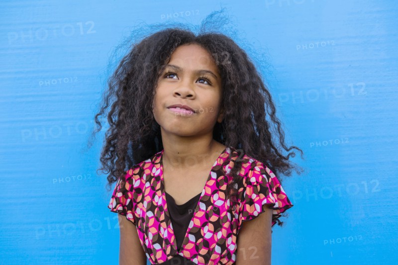 Pacific Islander girl looking up