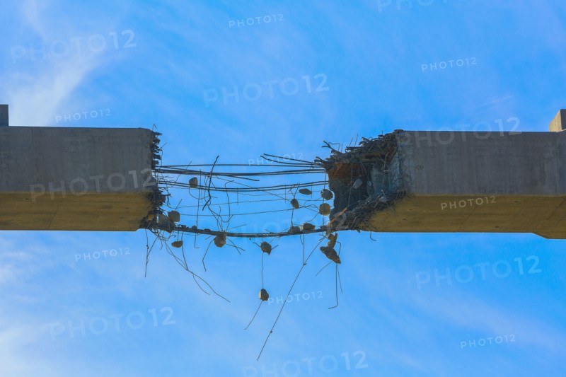 Close up of deteriorating concrete span under construction