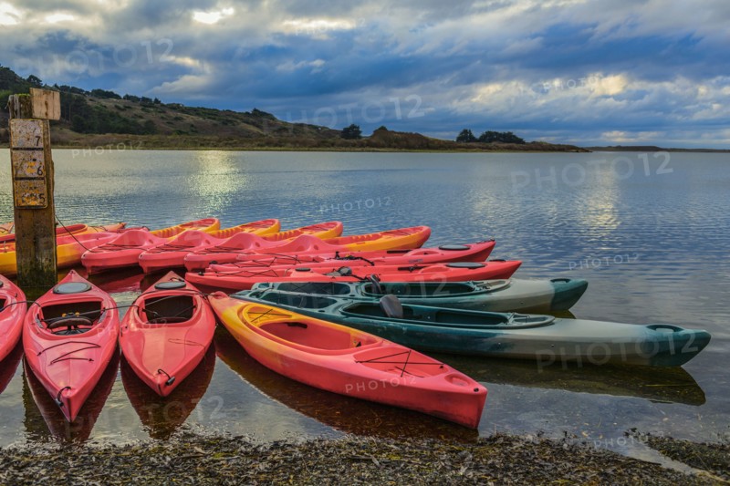 Empty canoes on calm remote lake