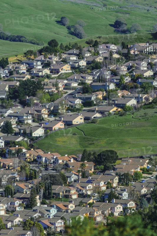 Aerial view of suburban neighborhood in rolling landscape