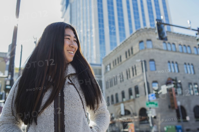 Chinese teenage girl smiling outdoors