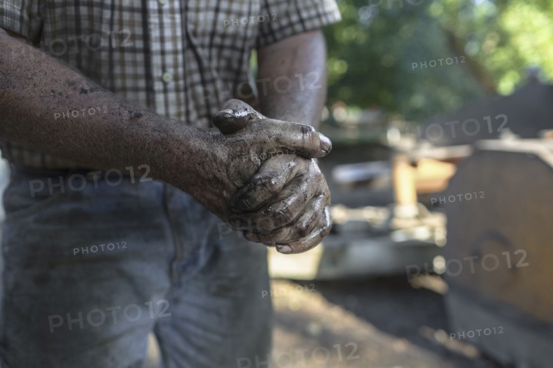 Greasy hands of Caucasian man