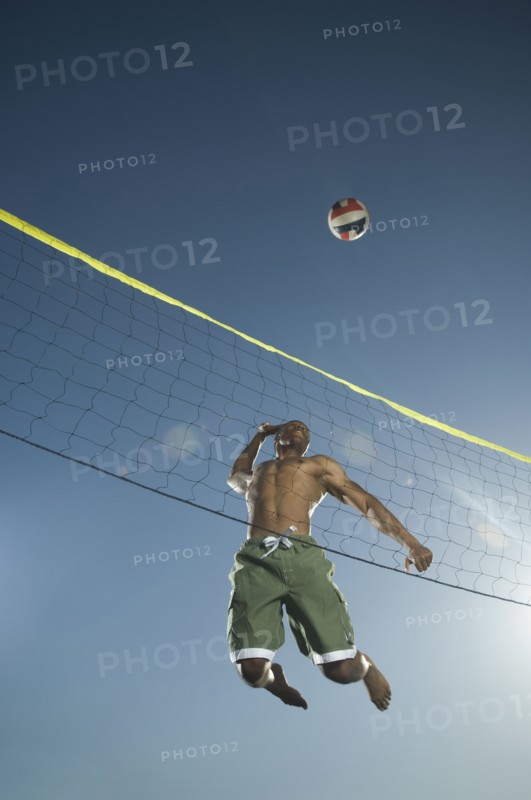 African American man playing volleyball