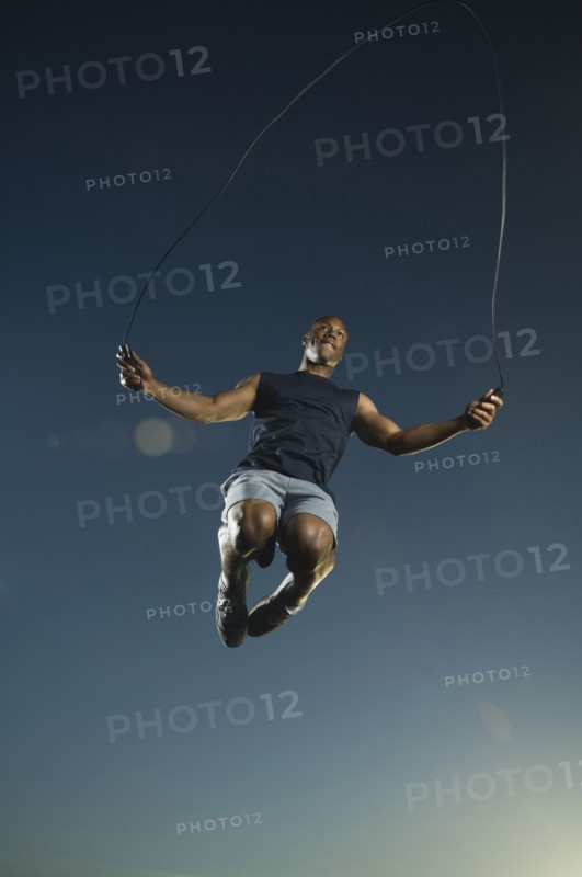 African American man jumping rope