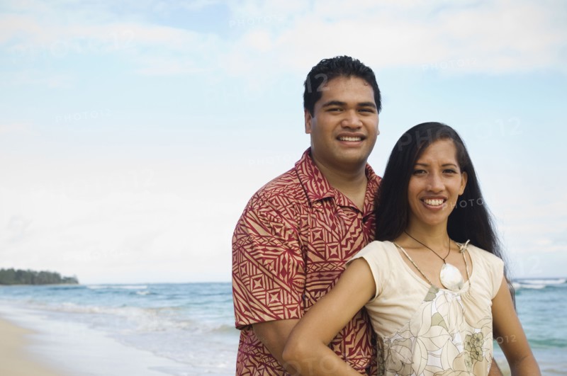 Pacific Islander couple at beach