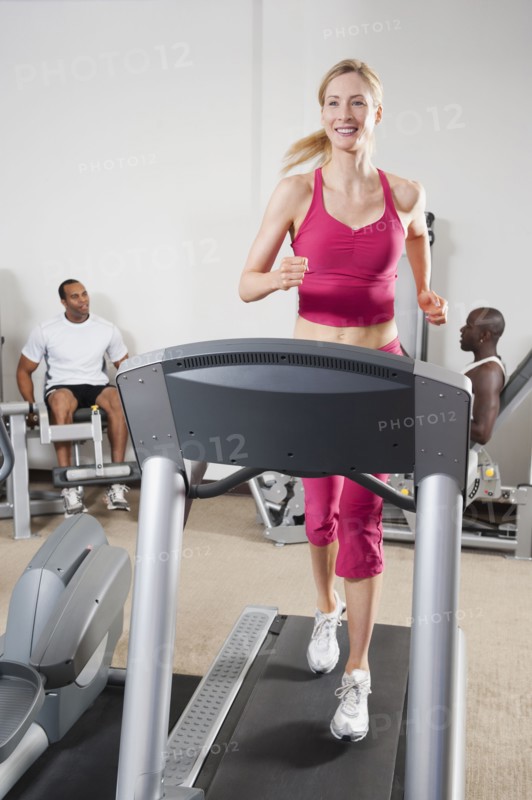 People exercising in health club