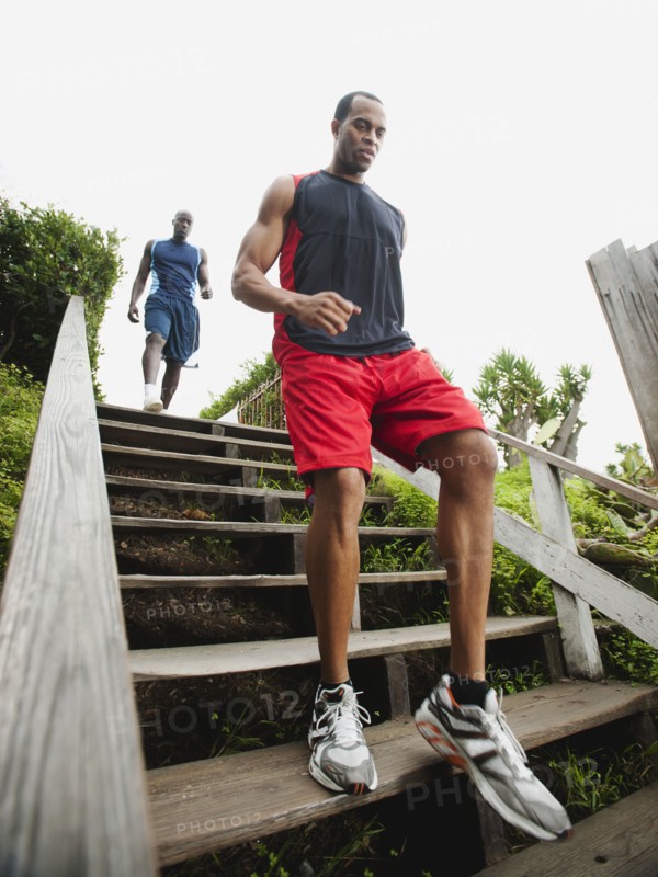 Men running down stairs for exercise