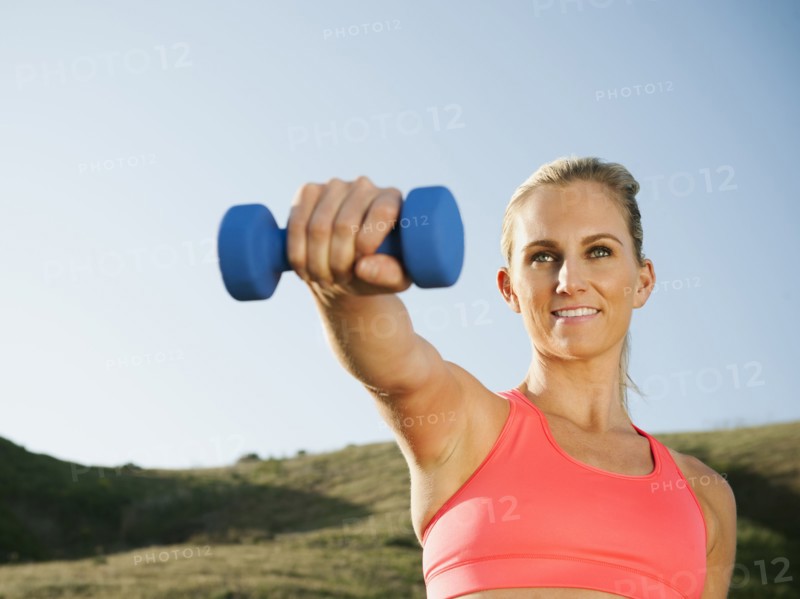 Caucasian woman exercising outdoors