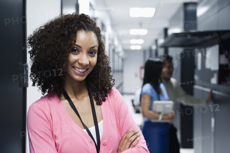 Black businesswoman standing in server room