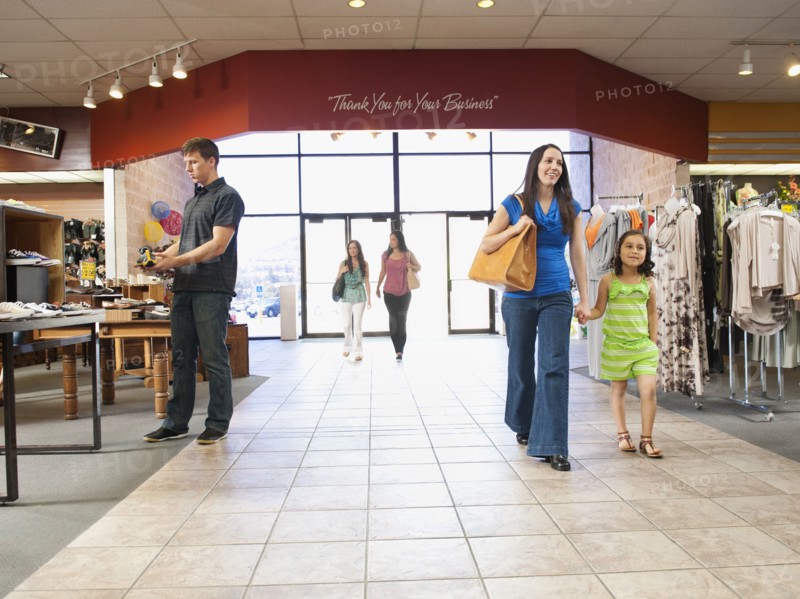 People shopping in clothing store