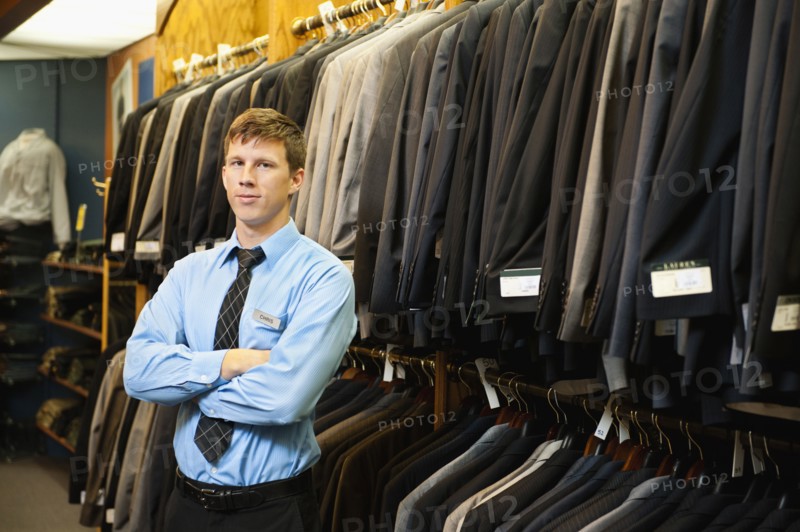 Caucasian man working in men's clothing store