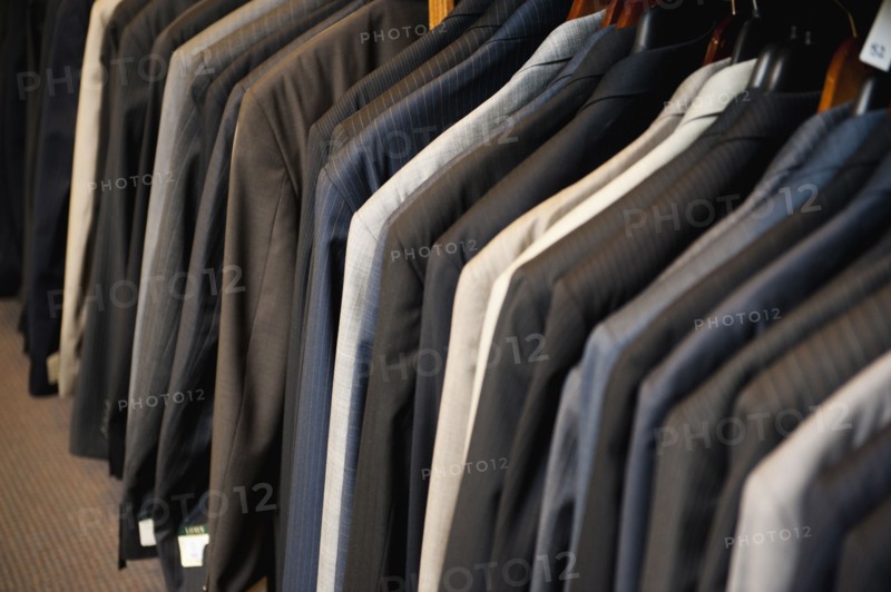 Men's suit jackets in clothing store