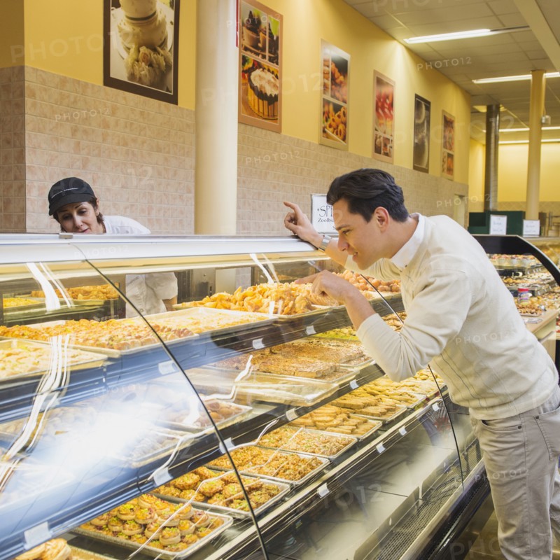Customer ordering at restaurant counter