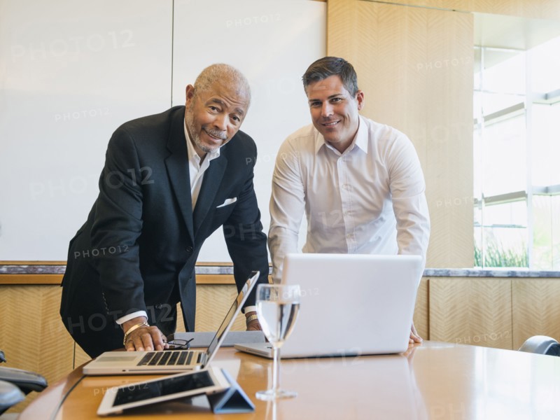 Businessmen talking in meeting