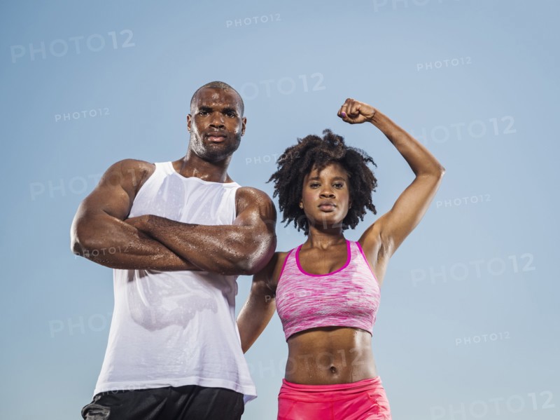 Portrait of confident sweating Black couple