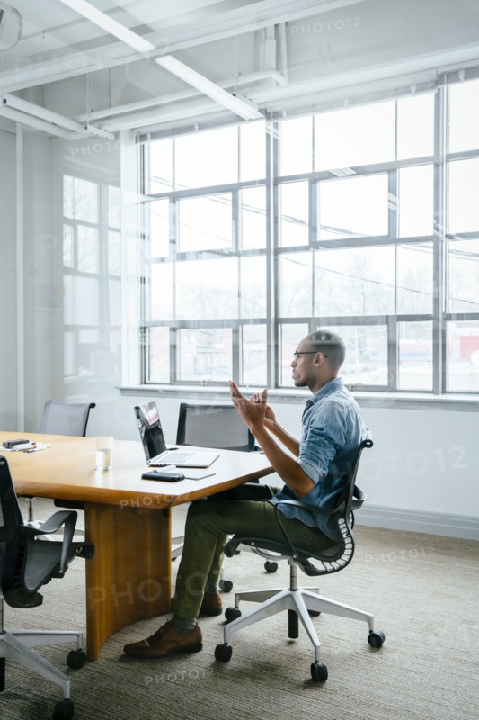 Black businessman on video conference