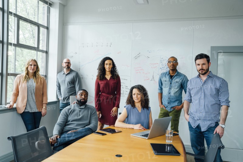 Portrait of diverse business people in conference room