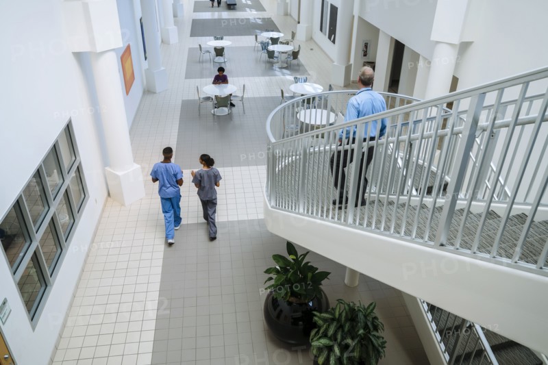 Doctor and nurses walking in lobby
