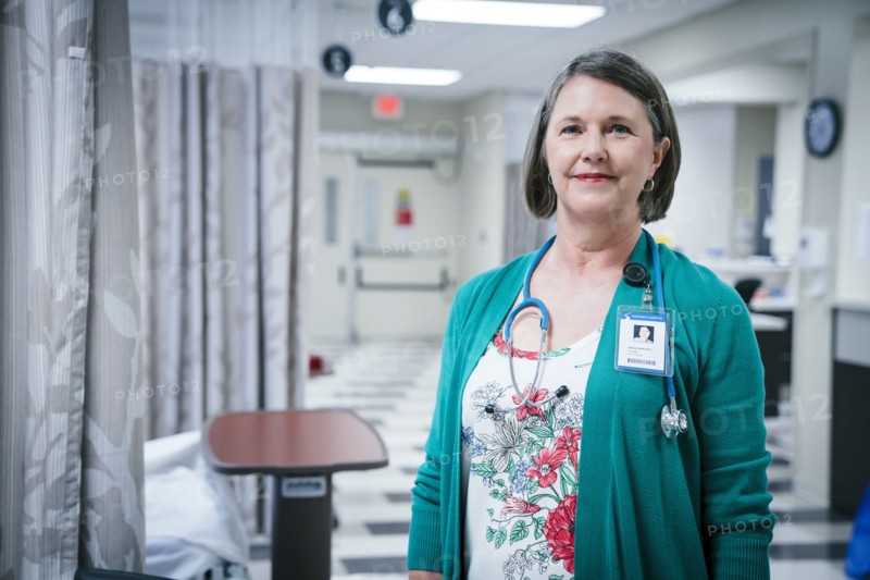 Portrait of smiling Caucasian doctor in hospital