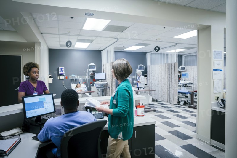 Doctor and nurses talking in hospital