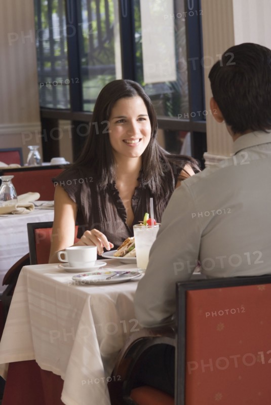 Hispanic couple at restaurant