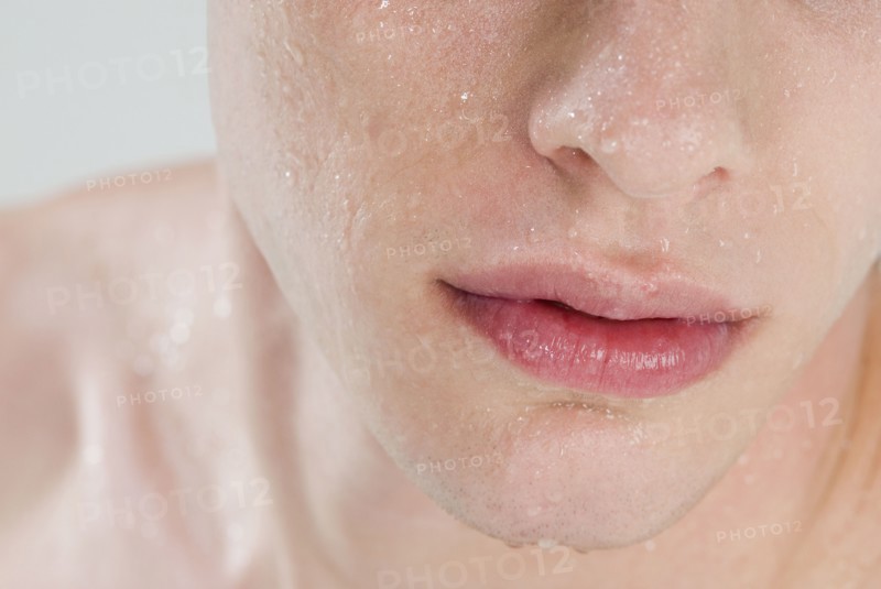 Close up of man's wet face