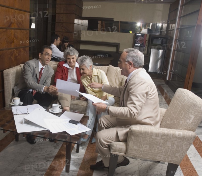 Hispanic businesspeople having meeting