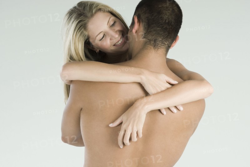 Hispanic couple hugging