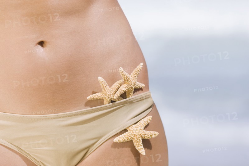 Starfish tucked into woman's bikini bottoms